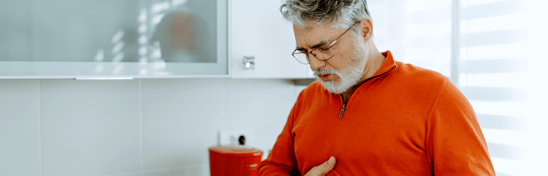 man suffering with digestive pain