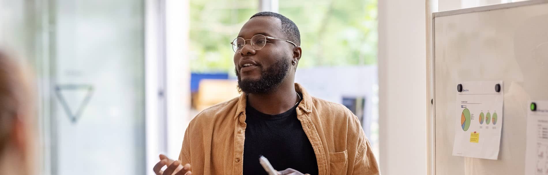 man giving an in person presentation