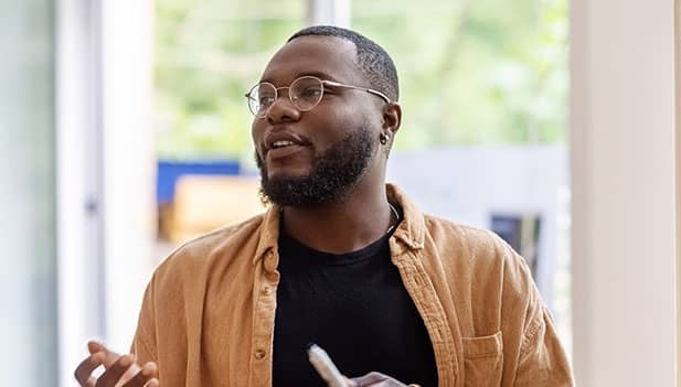 man giving an in person presentation