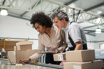 Man and woman in a warehouse