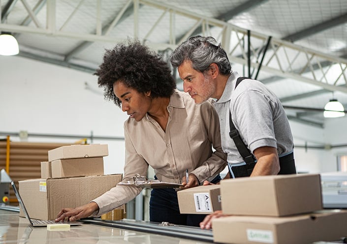 Man and woman in a warehouse