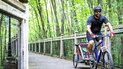 Man riding a bike in the forest