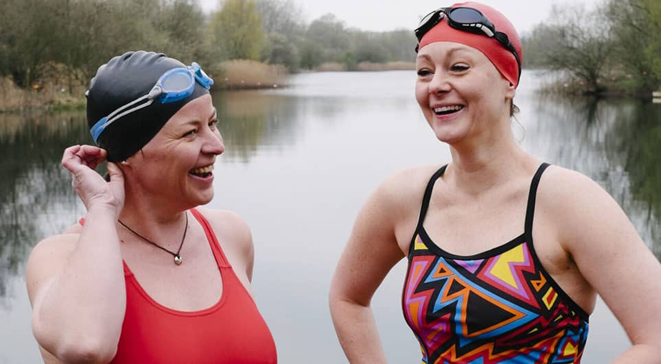 Ladies preparing to swim in lake